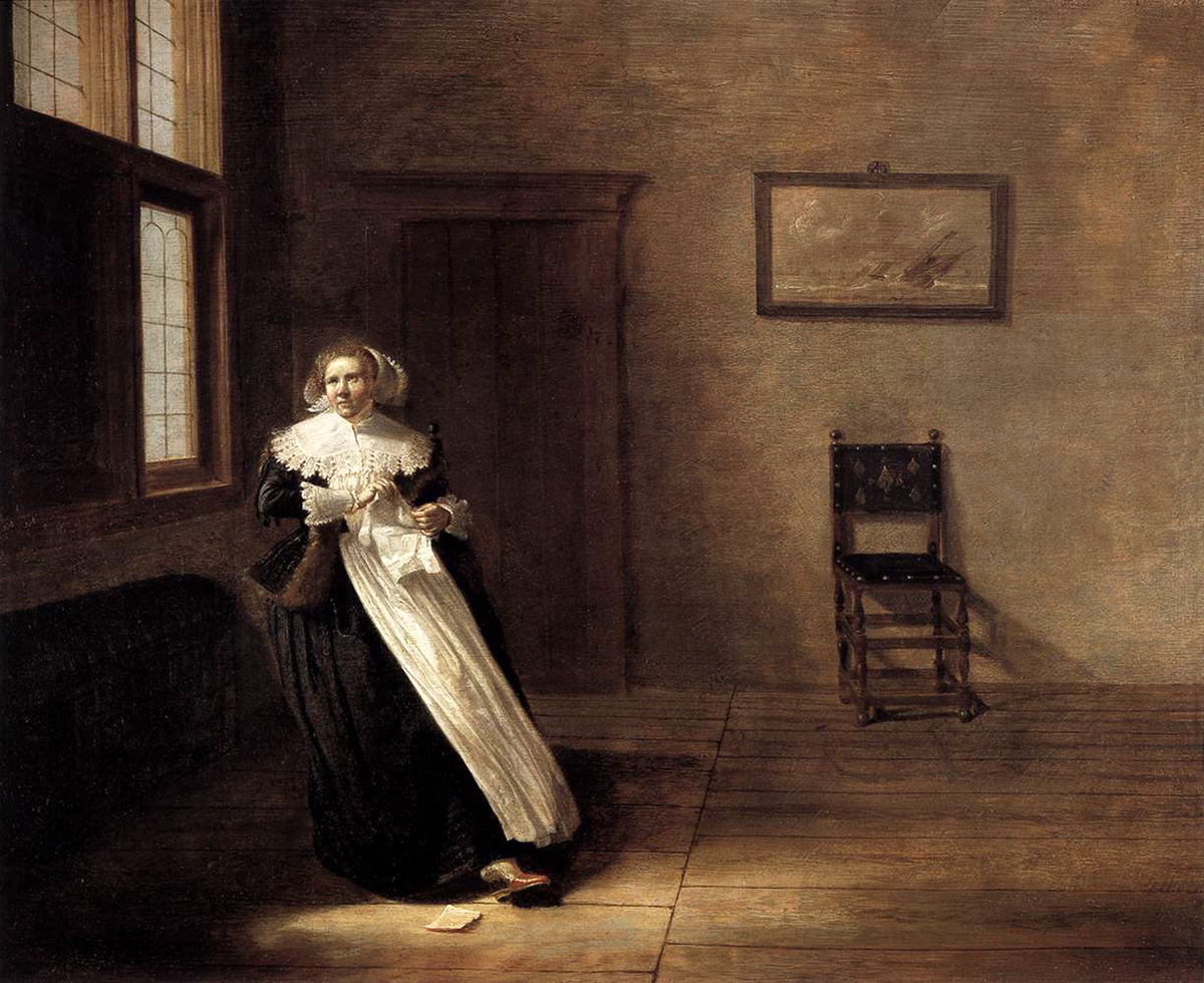 woman tearing a letter
